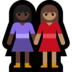 Windows系统里的女性牵手:深色肤色,中等肤色emoji表情